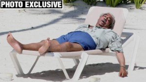 New York Post Photo of Charles Rangel relaxing on the white sand beaches of the DR